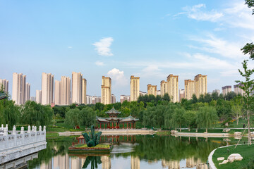 Fototapeta premium Twin Pagodas of Yongzuo Temple in Taiyuan, Shanxi: Twin towers with surrounding buildings