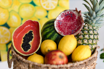 basket with fruit and homemade ceramics