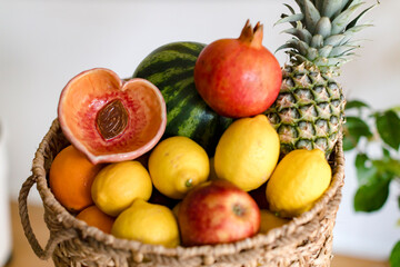 basket with fruit and homemade ceramics