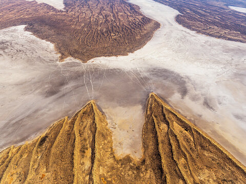Aerial view of Simpson Desert sand dunes and rugged terrain, Kalamurina, South Australia, Australia.