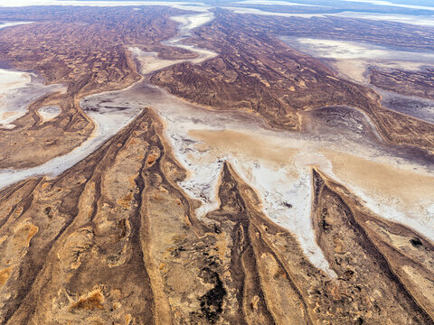 Aerial view of sand dunes and river in Simpson Desert, South Australia, Australia.