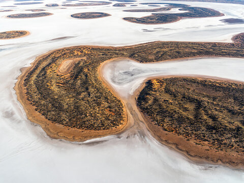 Aerial view of Lake Amadeus, salt lake with unique patterns and textures, Petermann, Northern Territory, Australia.