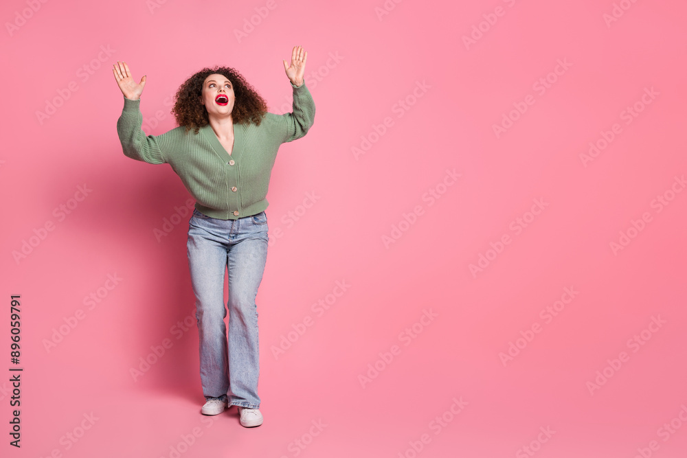 Wall mural photo of cheerful positive glad woman wear trendy khaki clothes look empty space isolated on pink co