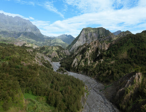 Aerial view of rugged canyon and volcanic caldera, Cirque de Salazie, Saint Benoit, Reunion.