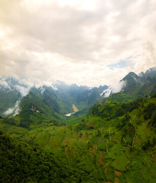 Aerial view of lush valley and river in Tu San Canyon, Nho Que River, Meo Vac, Ha Giang, Vietnam.