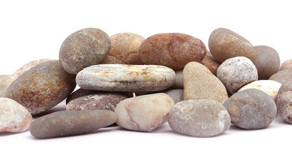 Pebbles piled on white background