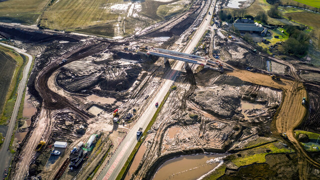 Aerial view of construction site and highway development in rural Luncarty, Scotland, United Kingdom, A9.
