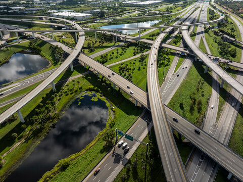 Aerial view of Sawgrass Interchange with highway, traffic, and palm trees, Davie, Florida, United States.