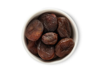 Ceramic bowl with dried soft brown healthy apricots isolated on white background.Top view.