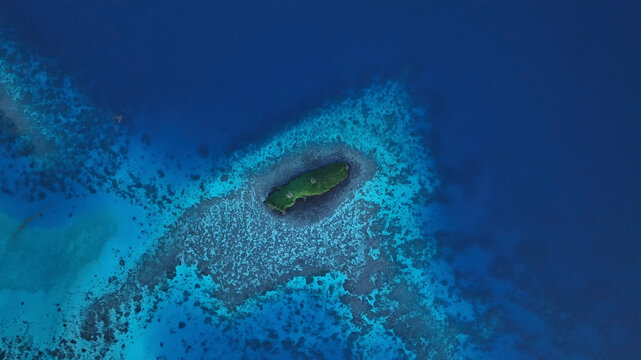 Aerial view of abstract island and reef in Fiji, Eastern.