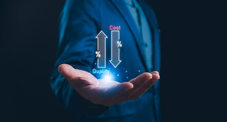 Quality control concept: A businessman holds symbols showing an upward arrow Quality and a downward arrow Cost management aimed at controlling expenses while product and service quality.