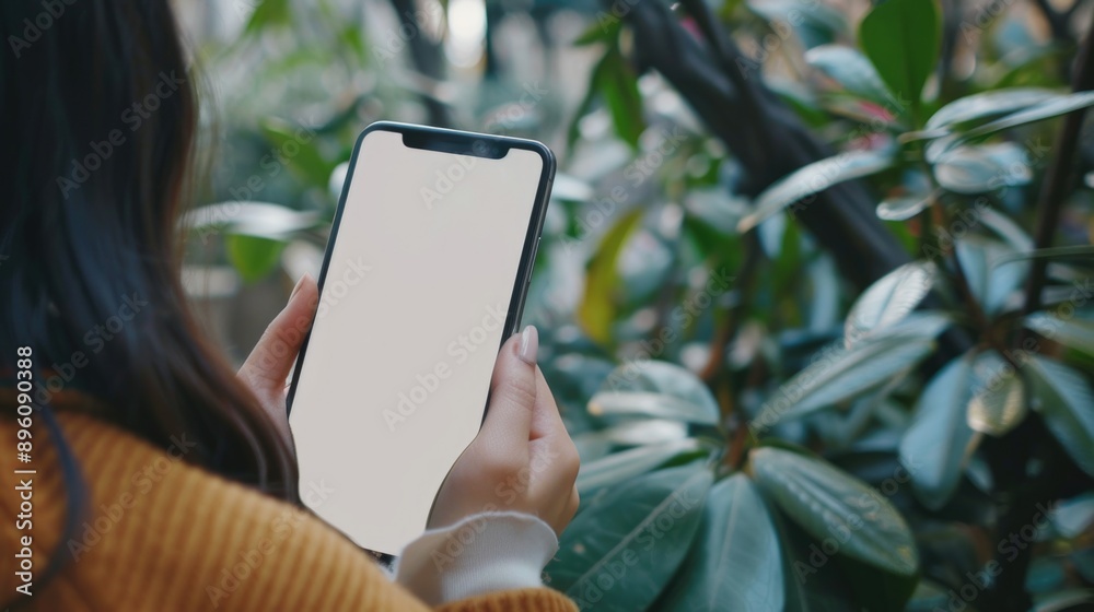 Poster a woman holds a cell phone with a blank screen, ready for connection or conversation