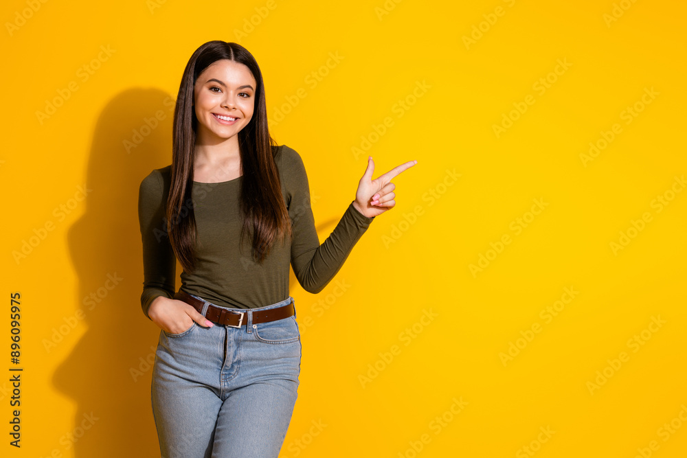 Sticker photo portrait of pretty teenager girl point empty space wear trendy khaki outfit isolated on yellow