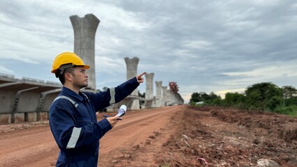  Engineer working at construction site try to inspect the project with determine and hard work.