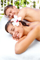 Massage, relax and happy couple at spa in nature for skincare, health and wellness on table....