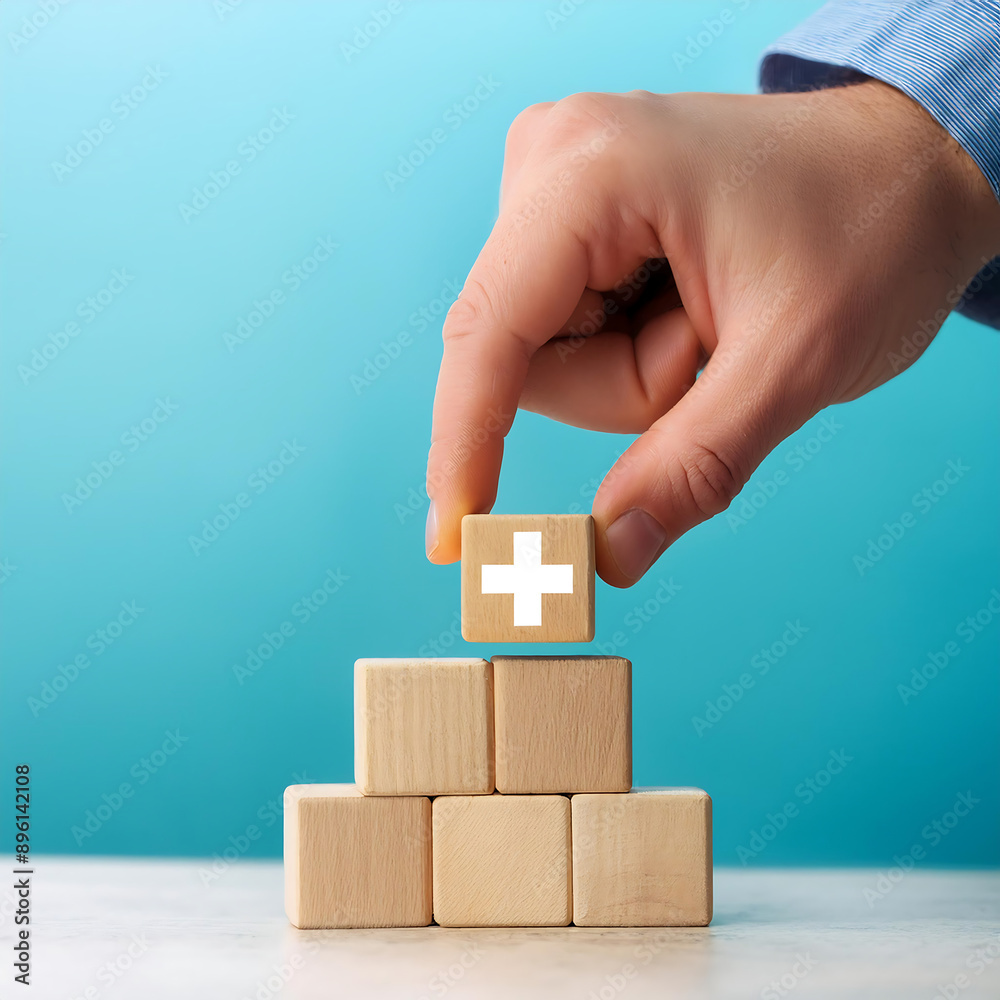 Poster value add concept- a hand places a wooden cube with a plus sign on a light blue backgro_1(329)