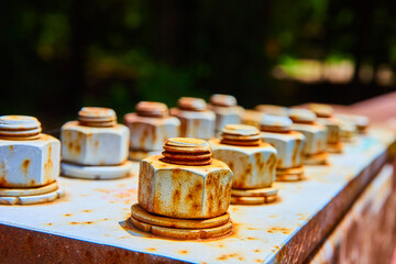 Rusted Industrial Bolts and Nuts Close-Up with Blurred Background