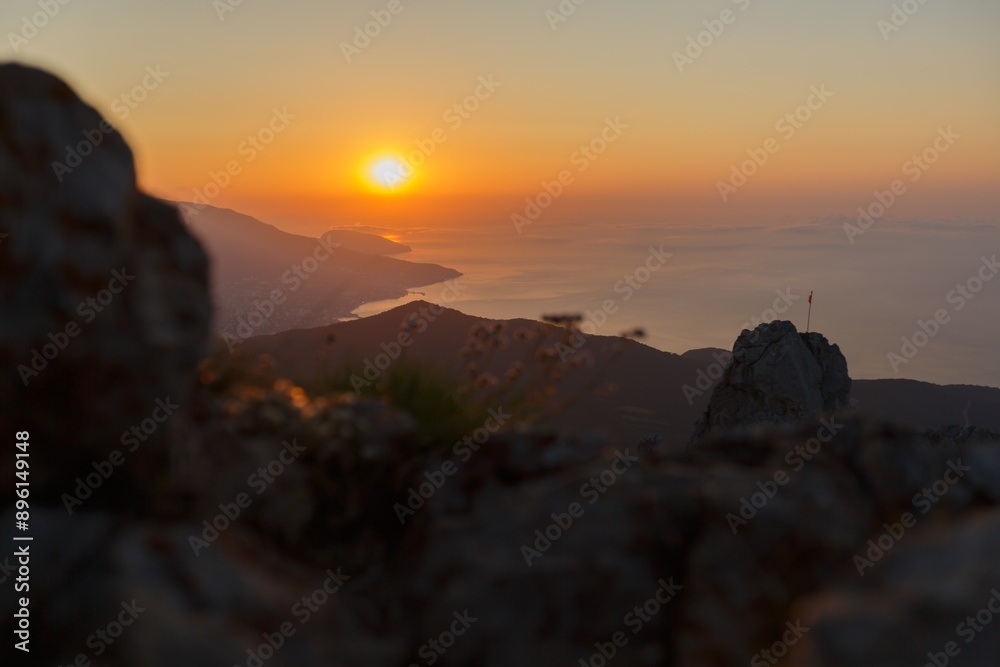 Poster Beautiful mountain landscape with sunset sky with sea