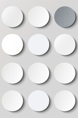 A set of white circles with shadows on a gray background, perfect for design and branding purposes