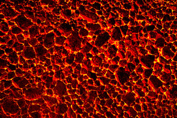 The texture of the glowing coal in the firebox. Fire pattern.