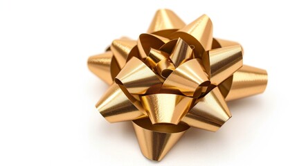 A gold bow is sitting on a white background