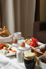  Classic hotel breakfast with various choice of food, eggs, cereals, pastry, jam, cheese and salami
