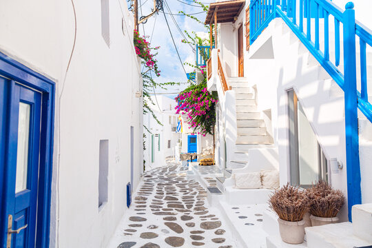 Fototapeta Mykonos island, Greece. Famous old town narrow street with white houses.