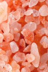 Background of Himalayan pink coarse salt.