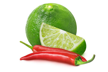 Limes and chili peppers on isolated white background.