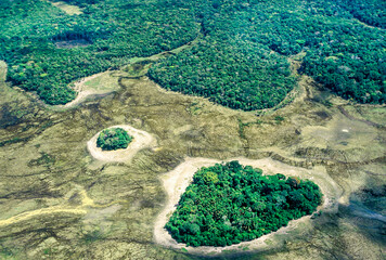 Aerial view of the Amazon Forest near Serra do Navio City, where the manganese deposits exported to Japan were exhausted. Amapá, Brazil 2012