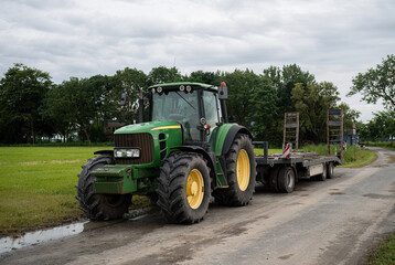 Agricultural tractor on the field