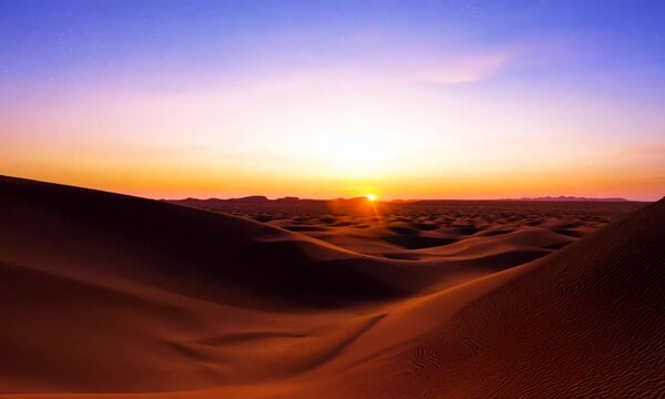 A sunset over a desert landscape. 4K Video