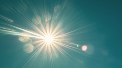Fototapeta premium Sun Glare Rays on Blue Sky Background with Lens Flare, Isolated on Blue Background, Nature Concept for Design Element and Background.