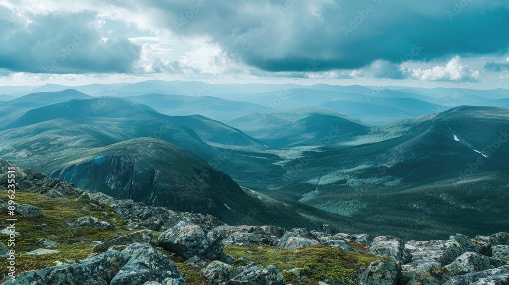Aufkleber panoramic view of a mountain range with clouds covering the sky, perfect for use in travel or nature