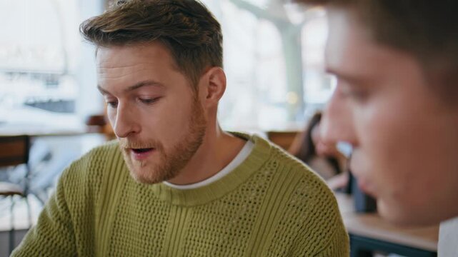 Startup people discussing project at coworking closeup. Men talking together