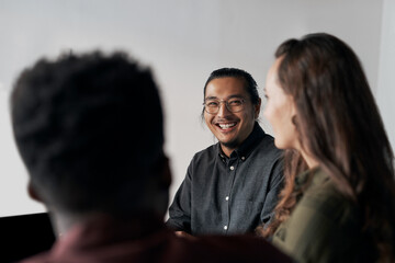 Creative, office and business people in meeting for discussion, problem solving and collaboration together. Teamwork, man and women in circle for planning, brainstorming and sharing ideas in chat