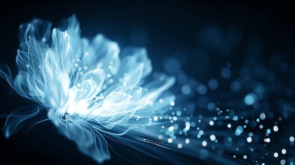 Obraz premium Abstract glowing blue flower with sparkling particles on black background.