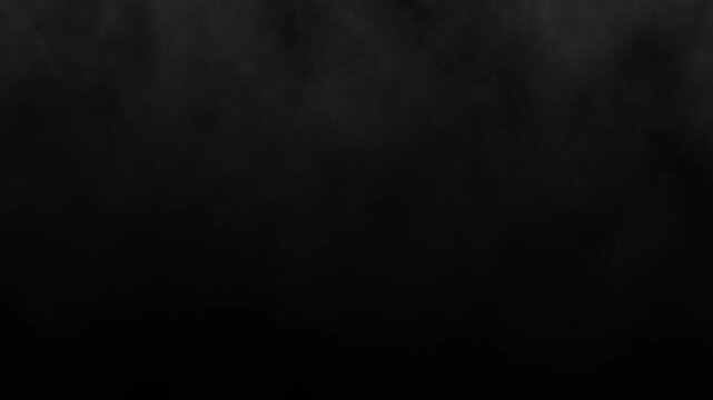A mysterious dark background with subtle smoke effects. Ideal for creating dramatic, moody visuals and backgrounds in design projects, presentations, or digital art. High quality 4k footage