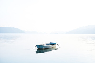 Small Rowboat in Calm Waters
