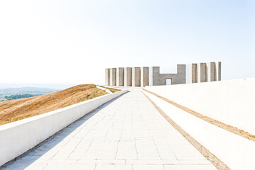 Concrete Pathway Leading to Modernist Architecture