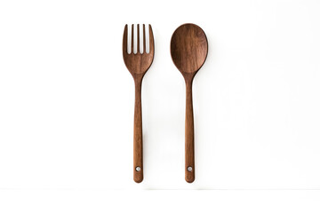 Wooden spoon and fork on white background