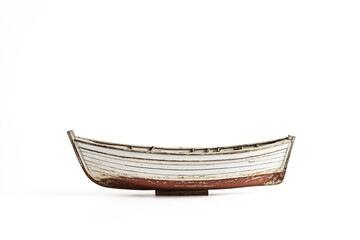 Obraz premium Old wooden boat isolated on white background