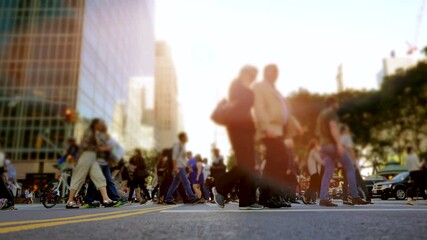 A lively urban environment filled with bustling pedestrians during the beautiful sunset