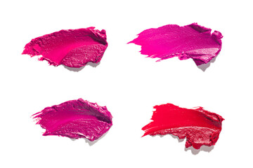 Fototapeta premium Lipstick pink fuchsia purple pink red orange beige palette set smudge background texture isolated on white background