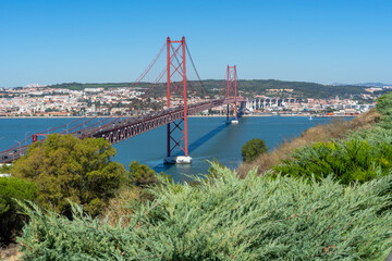 View of the 25 de Abril bridge in the south-north direction, Almada Lisboa from the atrium of the Cristo Rei.Almada-Portugal