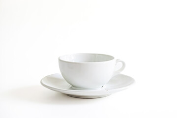 Fototapeta premium White Coffee Cup and Saucer on White Background