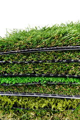 Close up of the artificial grass turf samples isolated on white