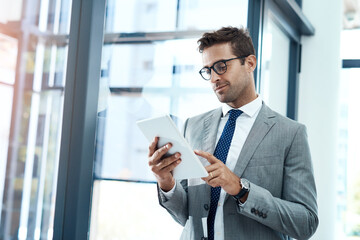 Smile, businessman and online with tablet in office for networking, risk assessment and audit...