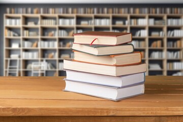 stack of reading books at library background