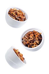 Caramelized onion in a bowl on a white isolated background